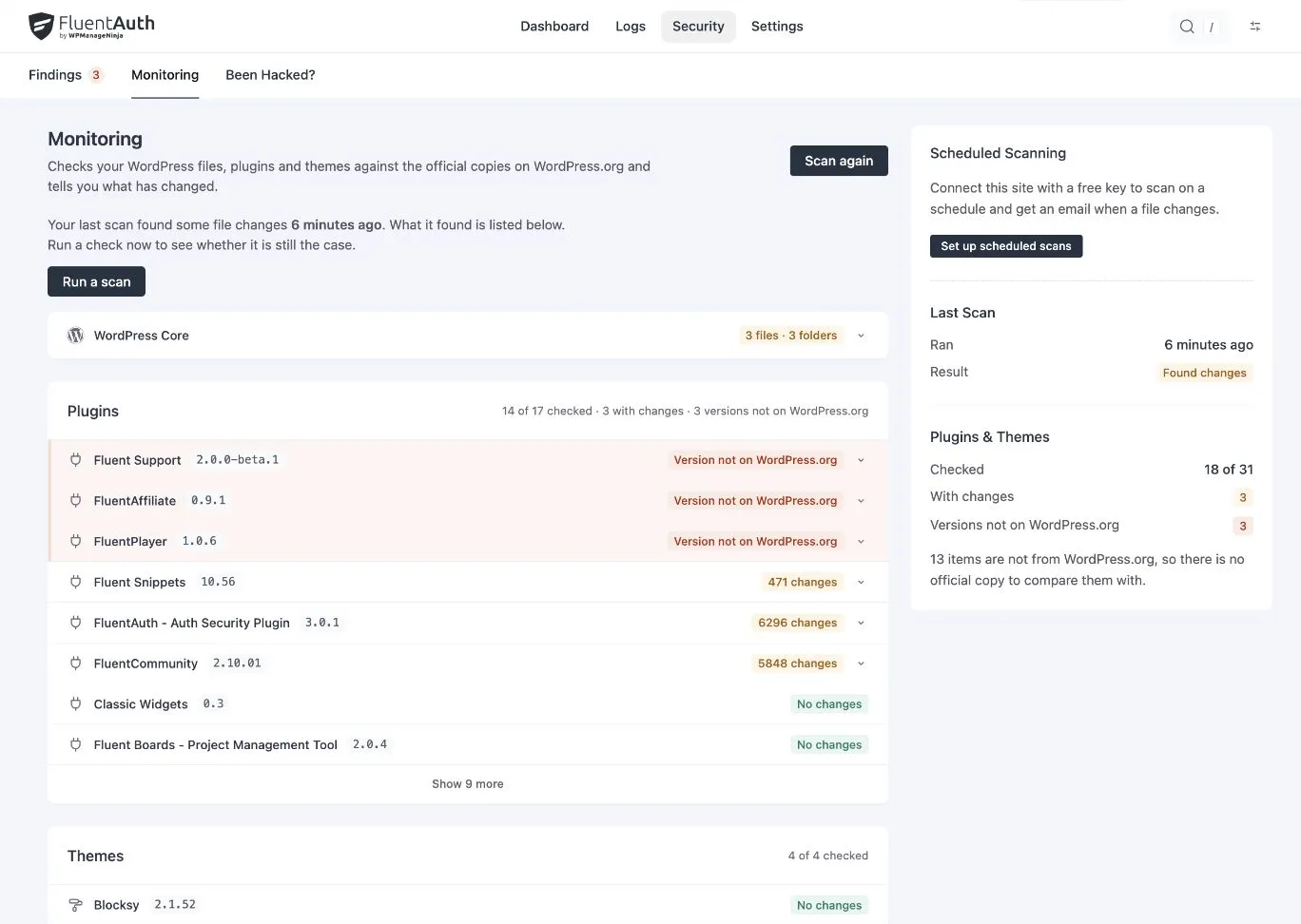 File monitoring results listing WordPress core, plugins and themes.